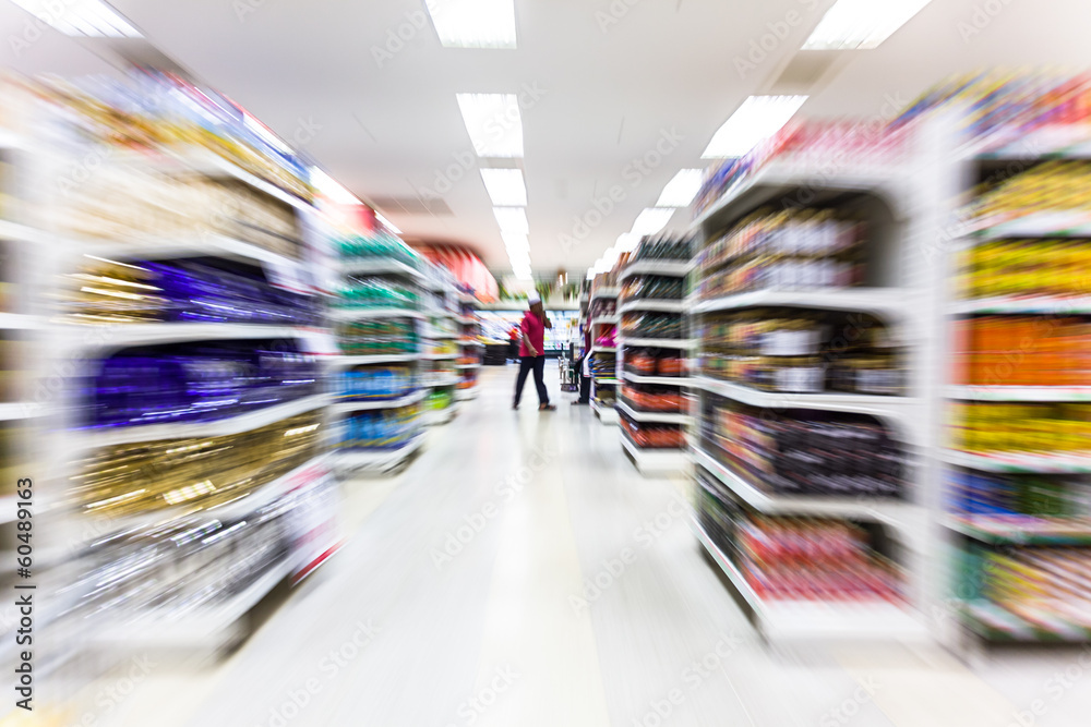 Fototapeta premium Empty supermarket aisle,motion blur