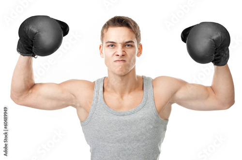 Angry boxer showing biceps photo