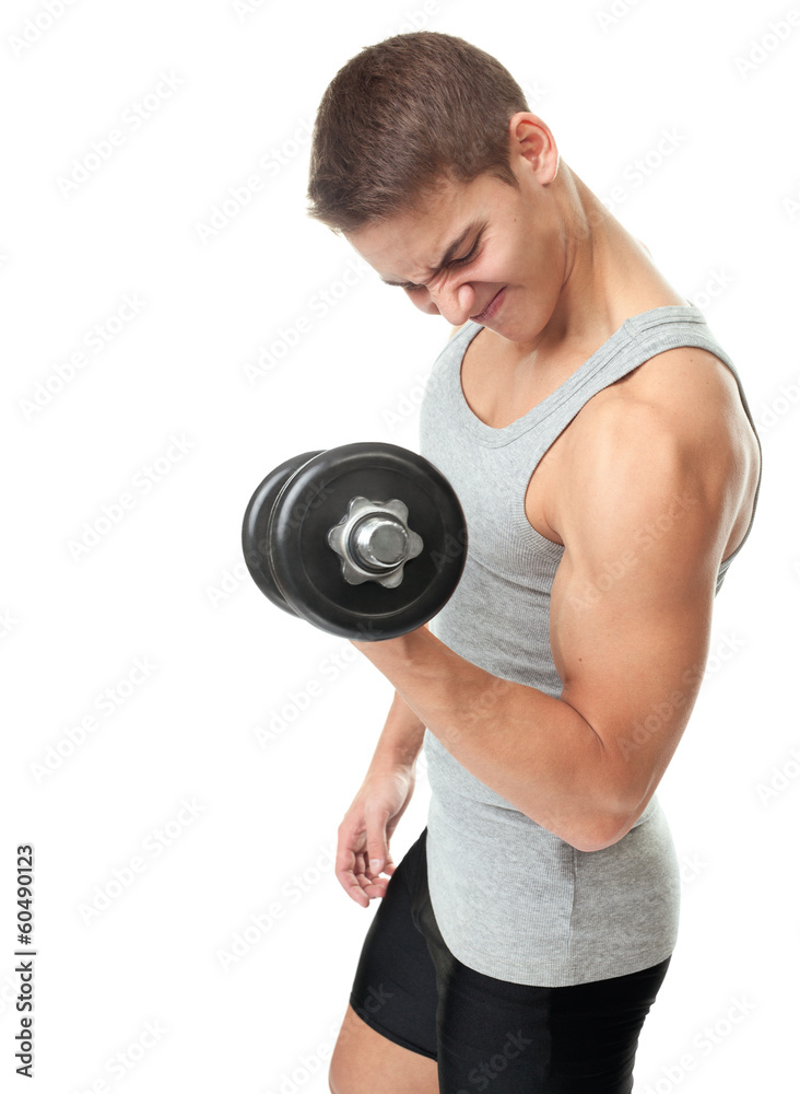 Fit man exercising with dumbbells Fit man exercising with dumbbells