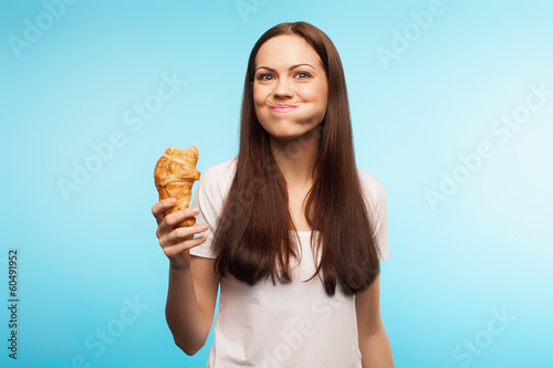 girl eating and smiling photo