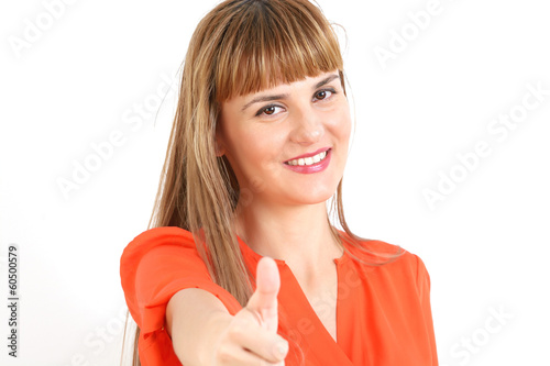 Happy smiling beautiful young woman showing thumbs up gesture, i