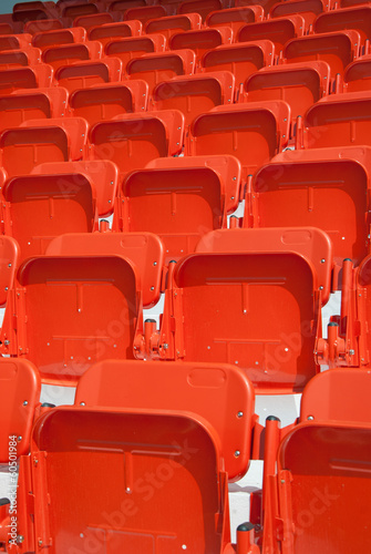 empty, red stadium seats