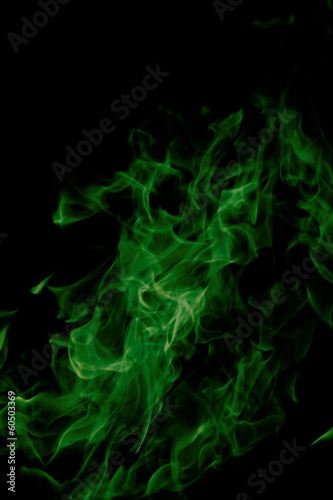 green fire on black background