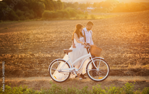 Wallpaper Mural Bride and groom with a white wedding bike Torontodigital.ca