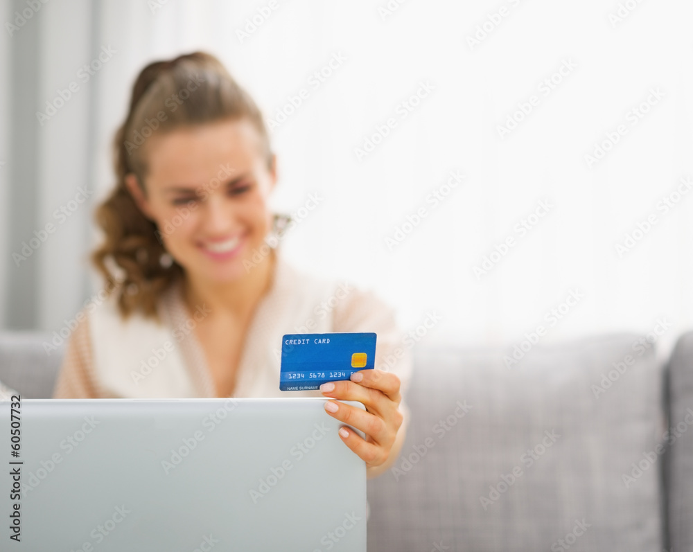 Closeup on young housewife making online shopping Closeup on young housewife making online shopping