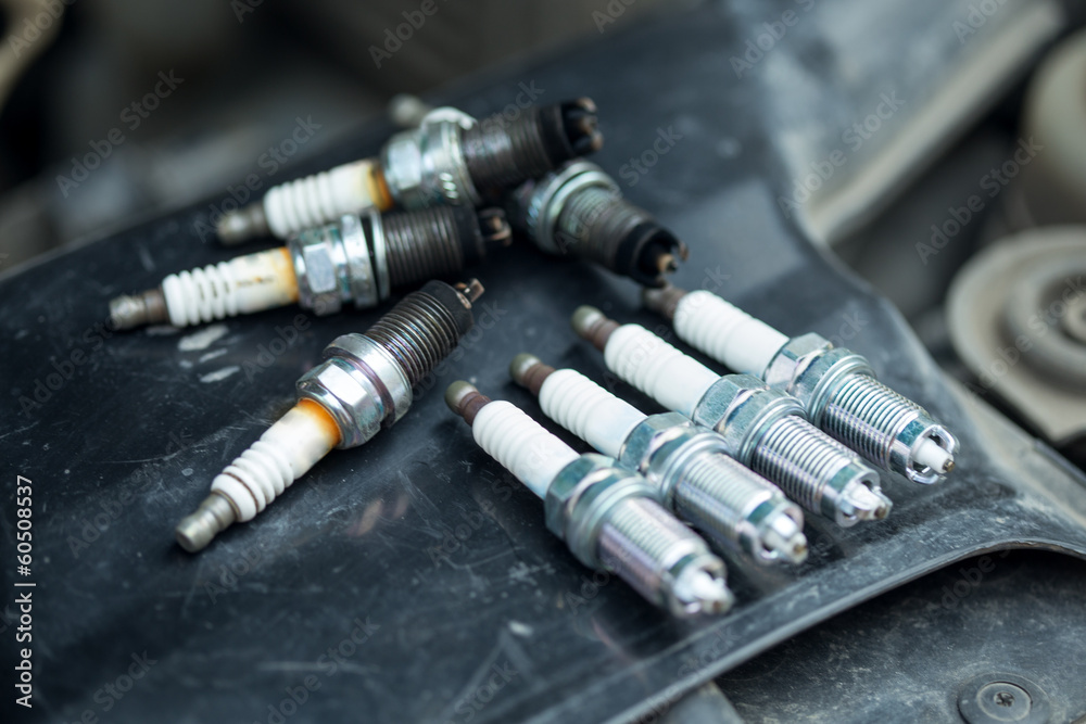 Worn and new spark plugs Worn and new spark plugs