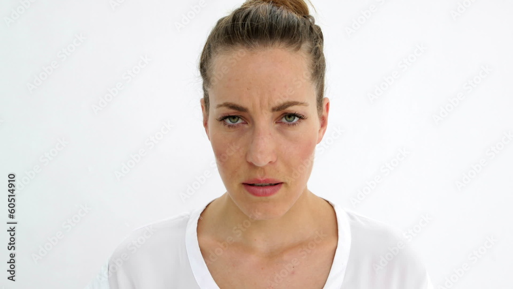 Annoyed woman shouting at camera
