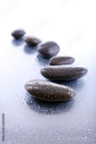 Spa stones on light background