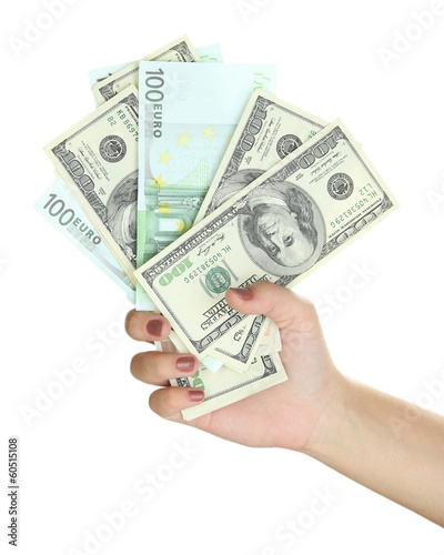 Female hand with dollars close up isolated on white