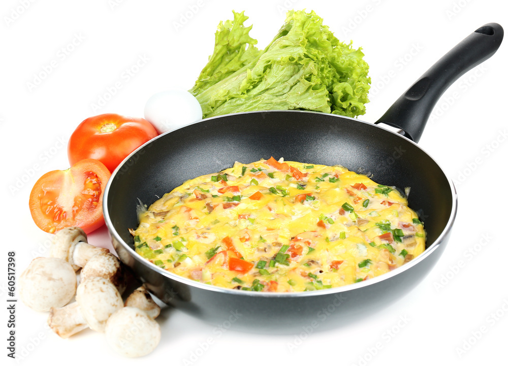Omelet with vegetables isolated on white