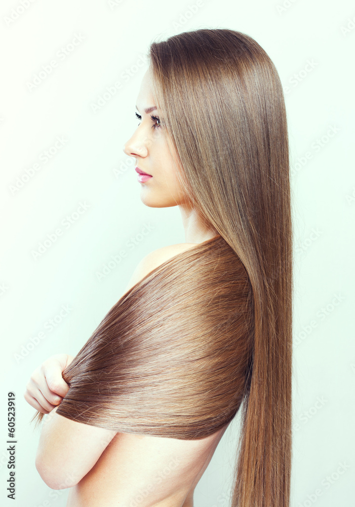 Obraz premium Beautiful Woman with Healthy Long Hair