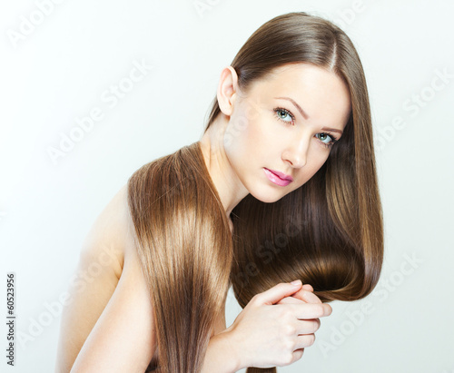 closeup portrait of a beautiful young woman with elegant long sh