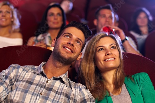 Photography Happy couple watching movie in cinema