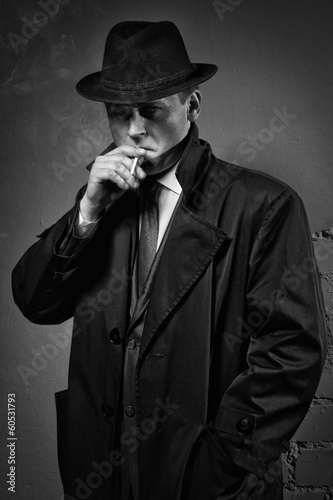 Detective smokes