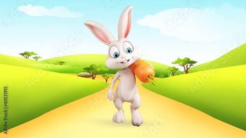 Easter bunny with big carrot and walkind photo