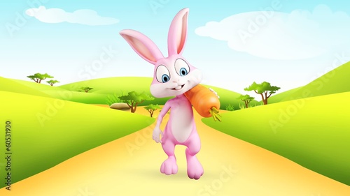 Easter bunny with big carrot and walkind photo