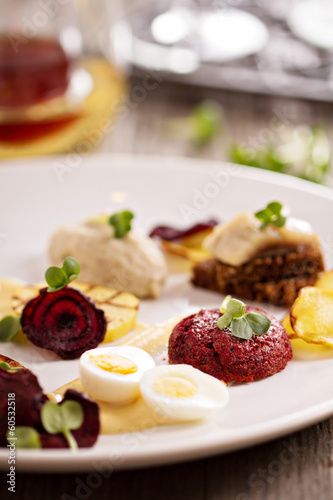 Gourmet salad with beet and herring