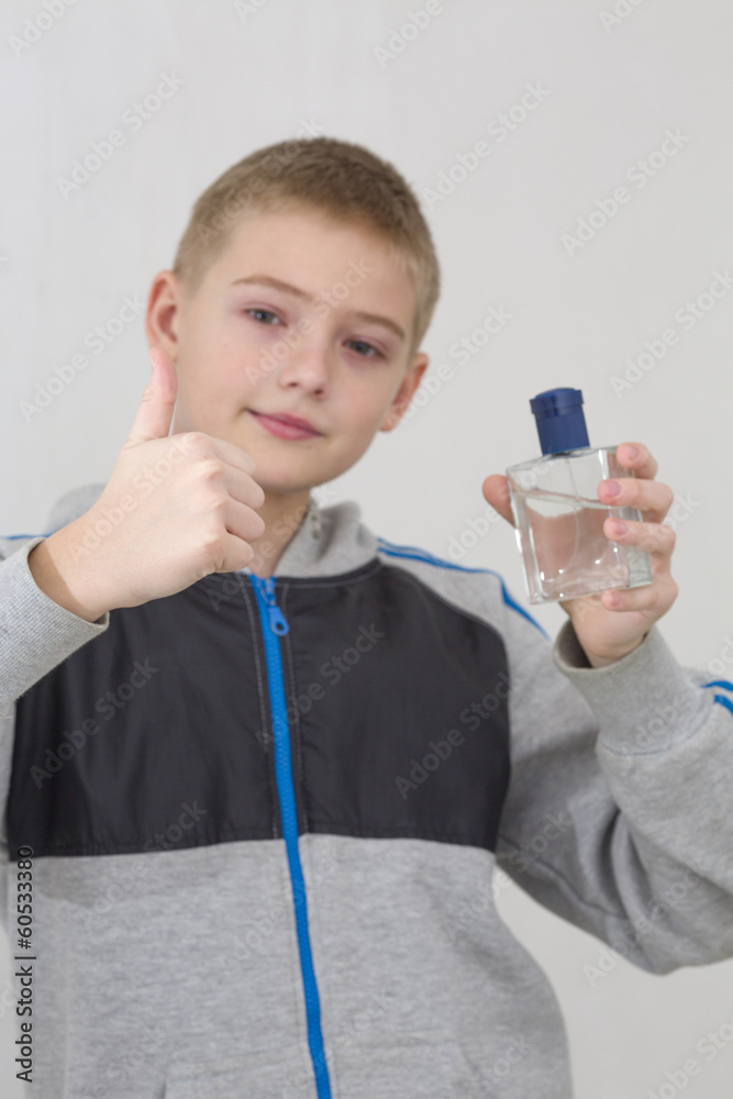 Young beautiful boy with perfume Young beautiful boy with perfume