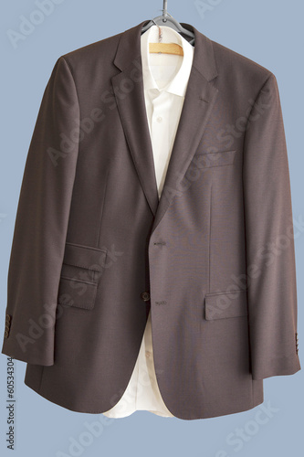 Suit and shirt on hanger