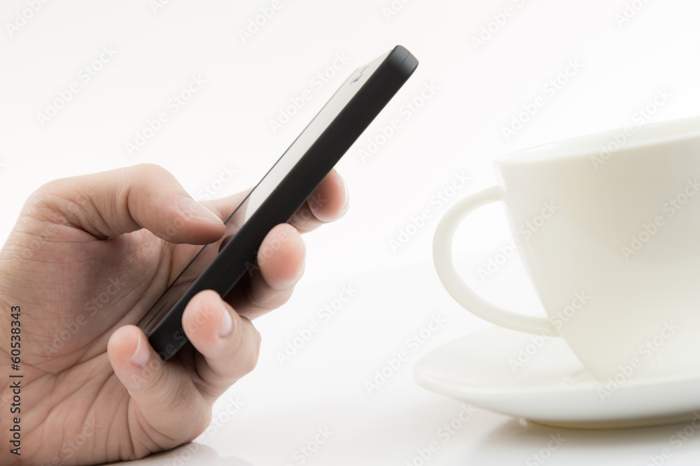 Businessman Using Cell Phone with coffee cup Businessman Using Cell Phone with coffee cup