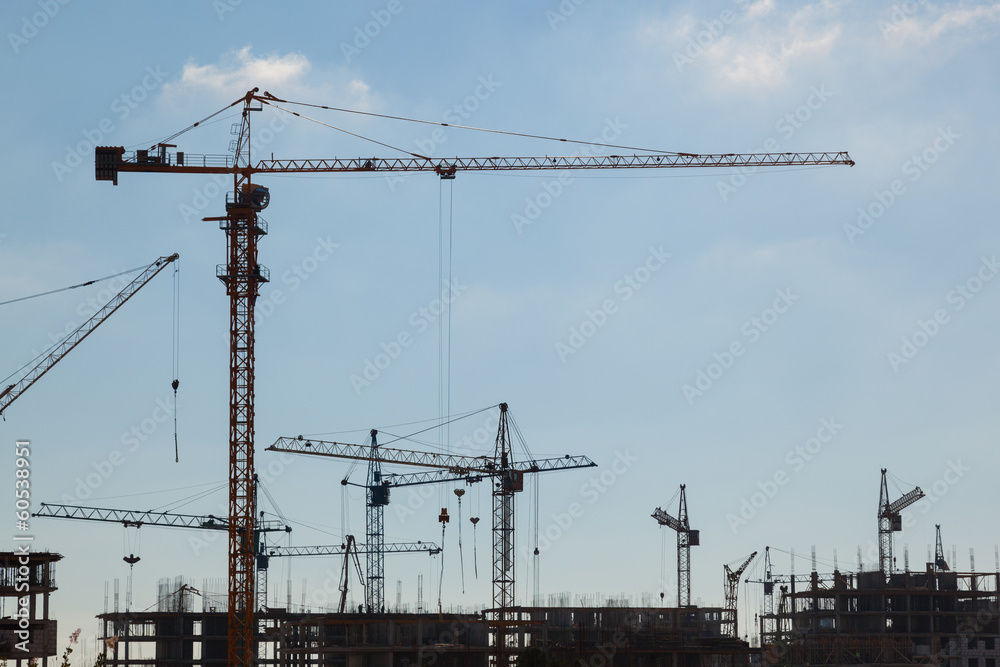 Construction cranes in the sky Construction cranes in the sky
