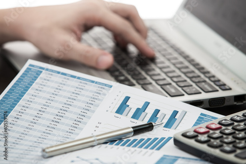 Businessman analyzing investment charts