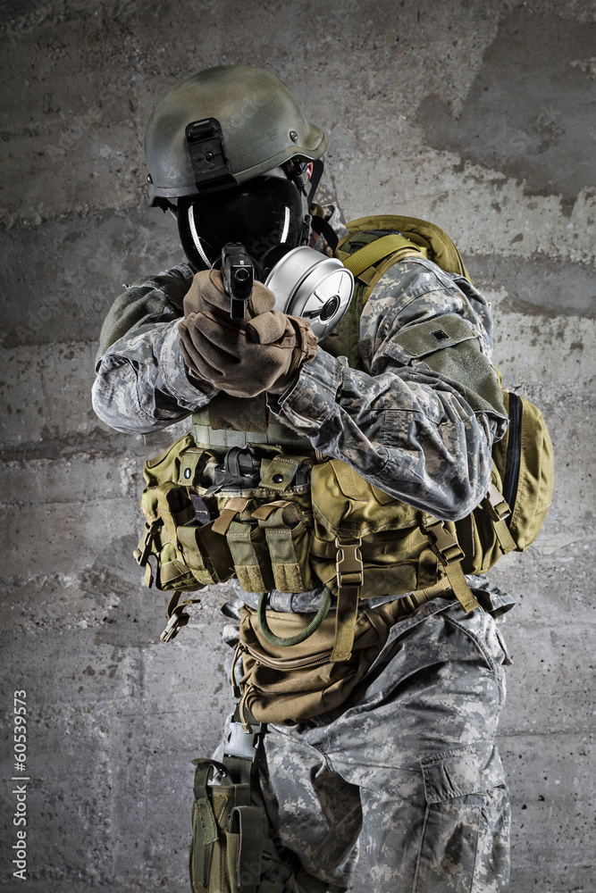 Fototapeta premium Gas Mask Soldier aiming pistol