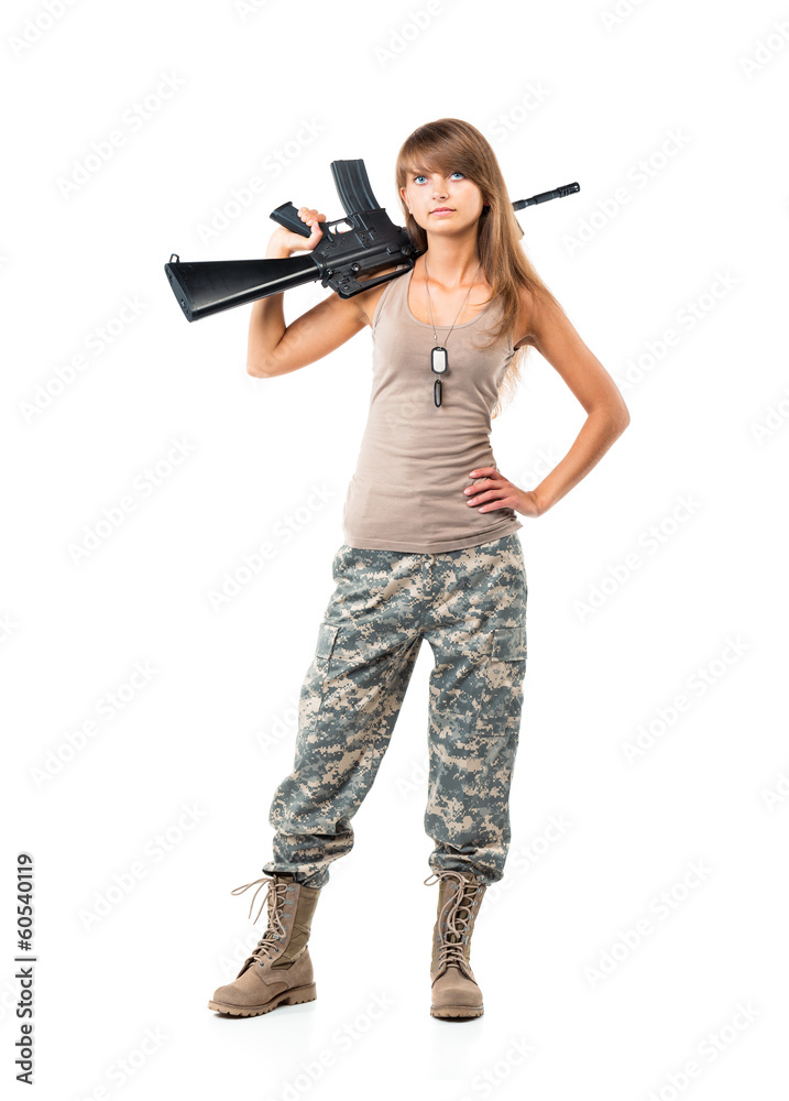 Soldier young beautyful girl dressed in a camouflage with a gun Soldier young beautyful girl dressed in a camouflage with a gun