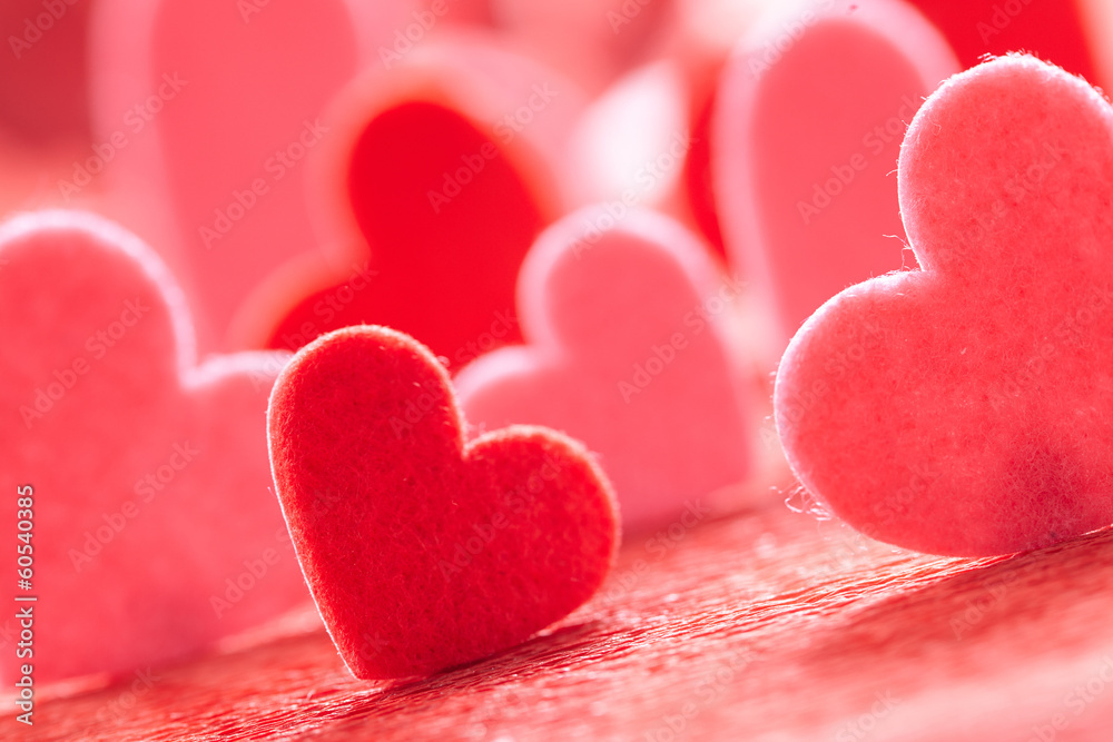 Fototapeta premium Hearts on red background