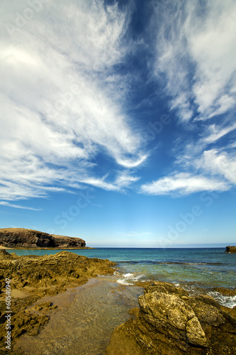 rock stone  water  coastline and summer in lanzarote spain