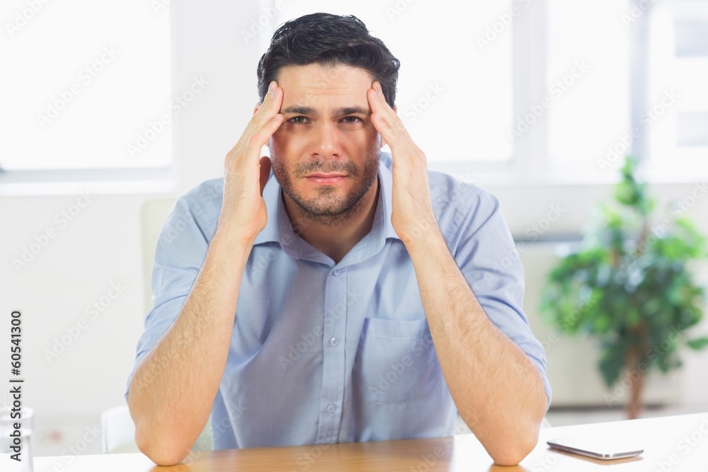 businessman suffering from headache businessman suffering from headache