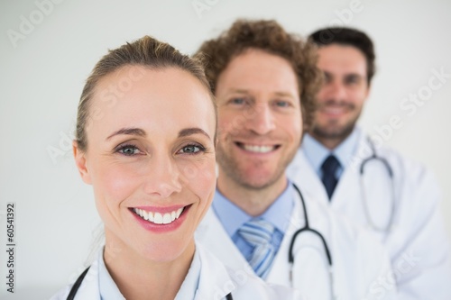 Smiling doctors in a row