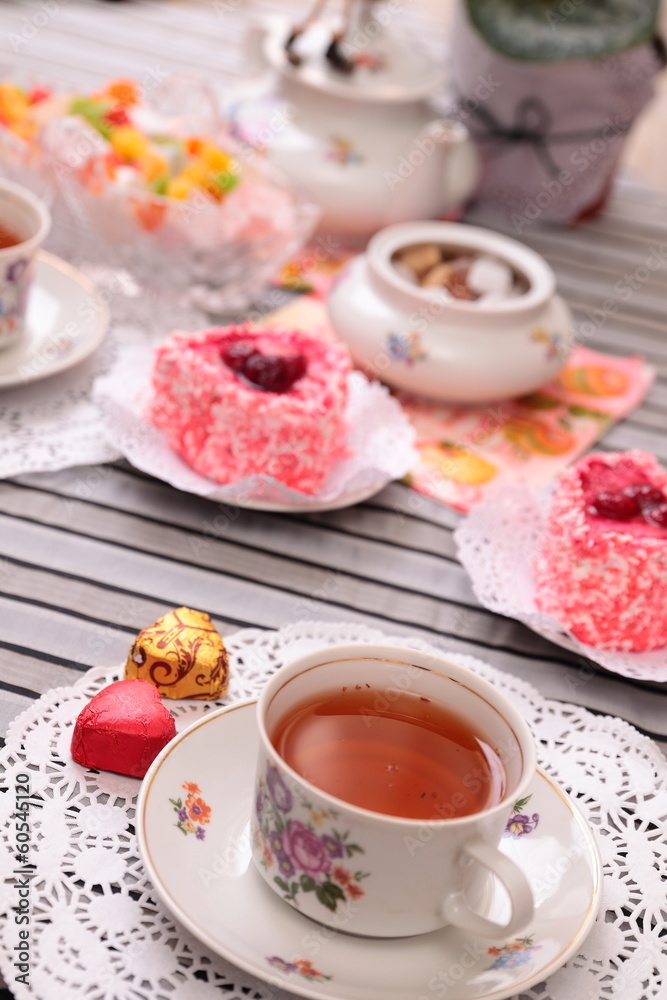 Warm cup of tea and sweets Warm cup of tea and sweets