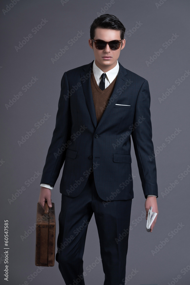 Retro 50s business fashion man with dark grease hair. Wearing da Retro 50s business fashion man with dark grease hair. Wearing da