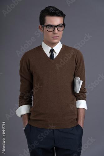 Obraz na plátně Retro fifties fashion man with dark grease hair. Wearing brown s