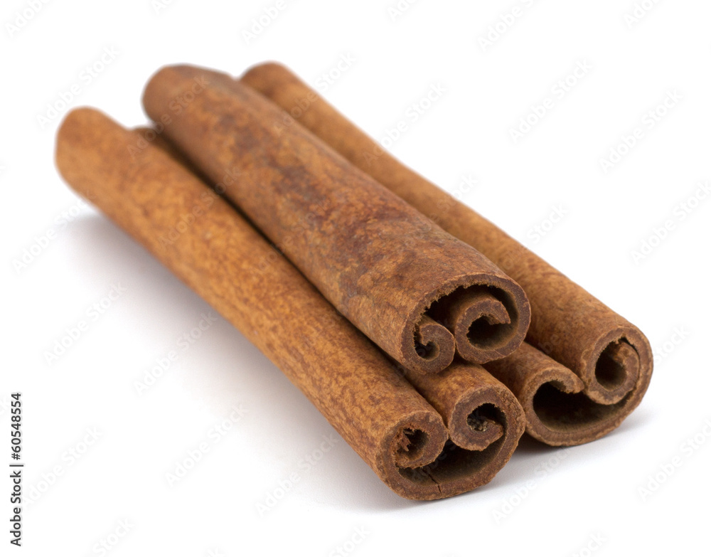 cinnamon sticks stacked on white background cinnamon sticks stacked on white background