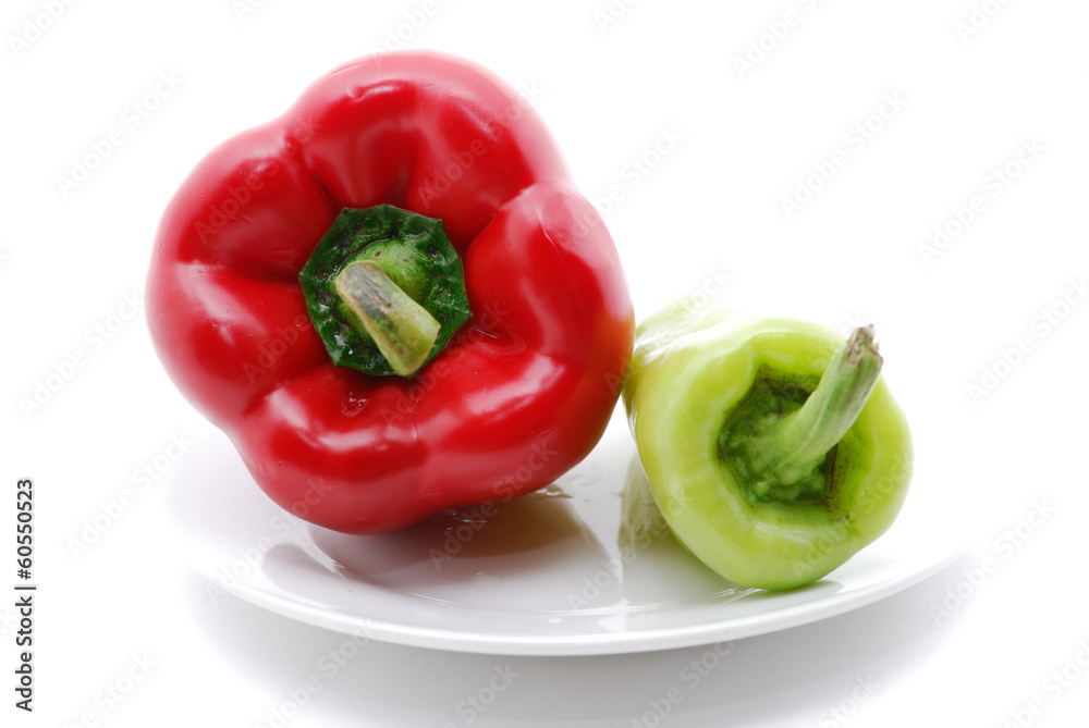 fresh red and green paprika on white background fresh red and green paprika on white background