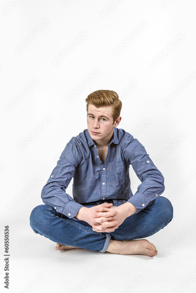 cool boy with red hair posing in studio cool boy with red hair posing in studio