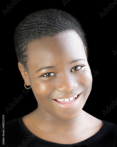 Portrait of a young Afro beauty (low key)