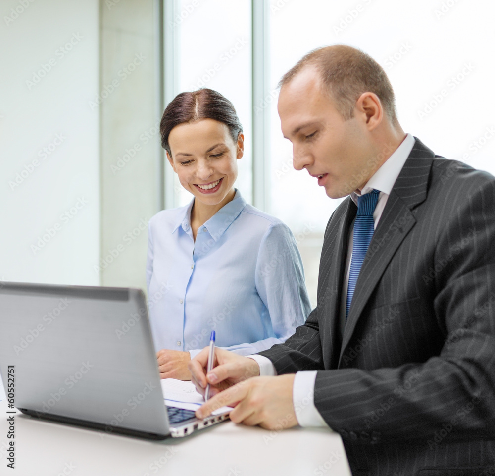 business team with laptop having discussion business team with laptop having discussion
