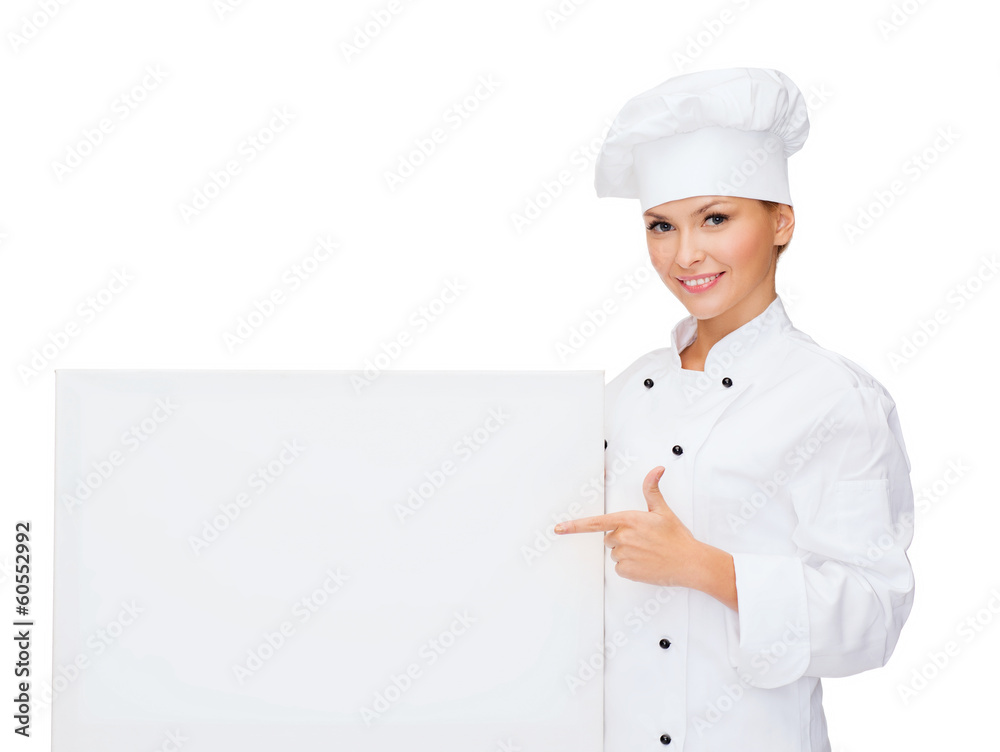 smiling female chef with white blank board smiling female chef with white blank board