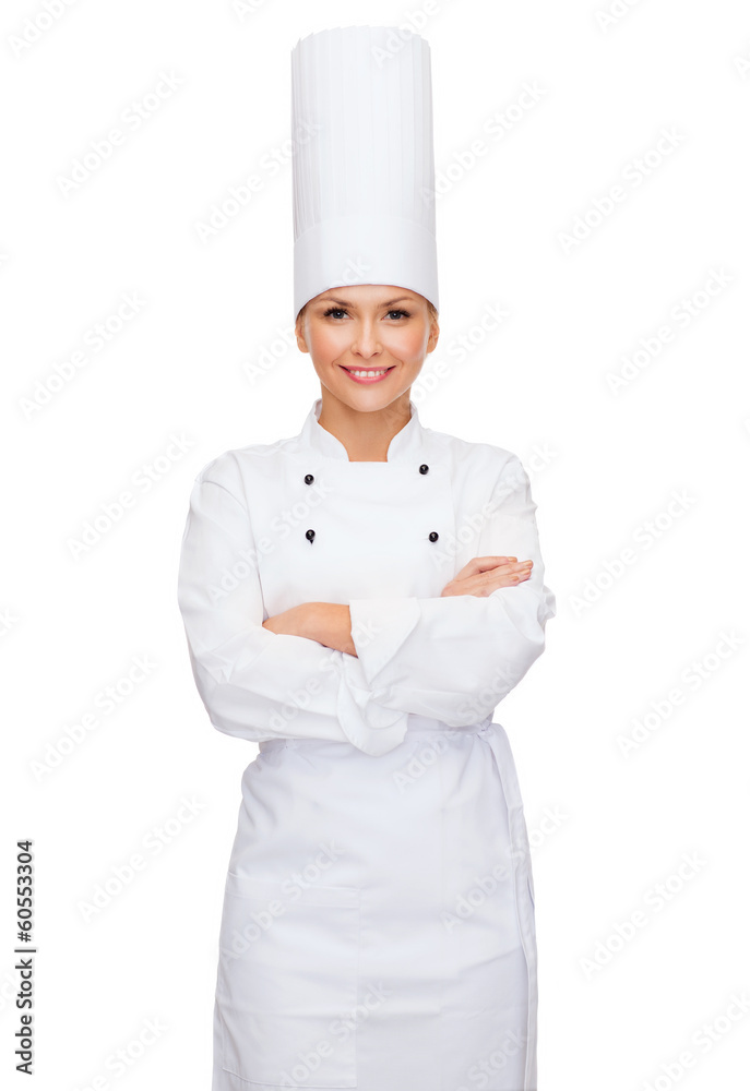 smiling female chef with crossed arms smiling female chef with crossed arms