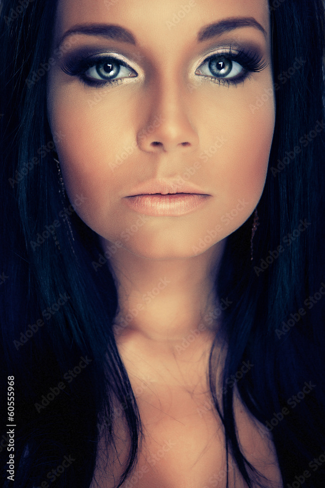 portrair girl with blue eyes and dark lashes