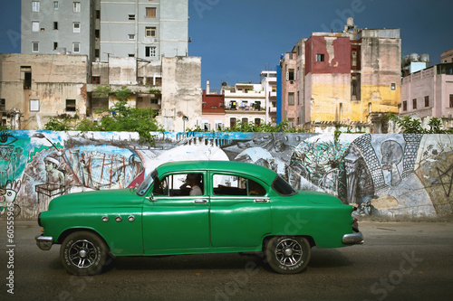 HAVANA, CUBA - JUNE 27: Vintage cars on the streets of Havana, J © sunsinger