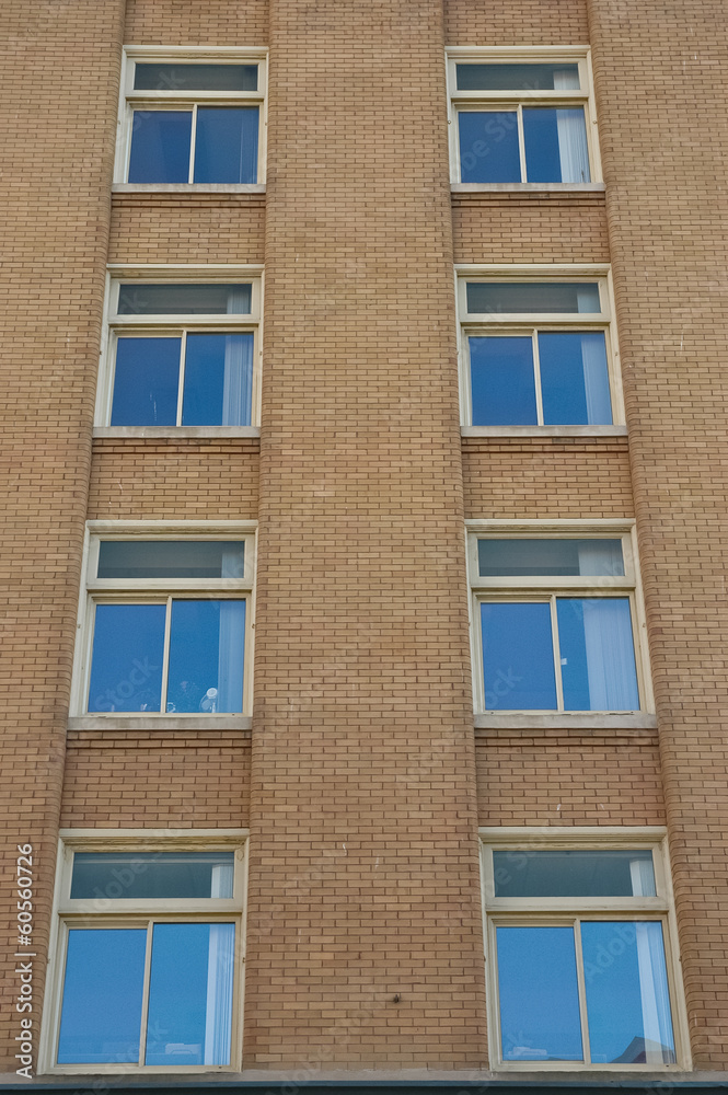 Fototapeta premium sky reflection on windows of heritage building