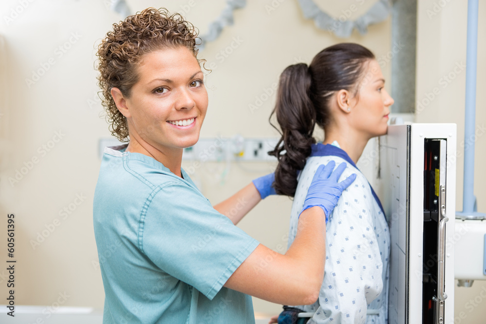 Fototapeta premium Nurse Preparing Young Patient For Chest Xray