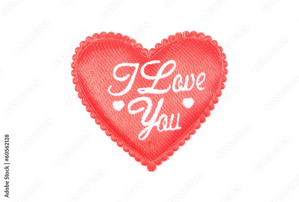 Closeup of red heart isolated on white background