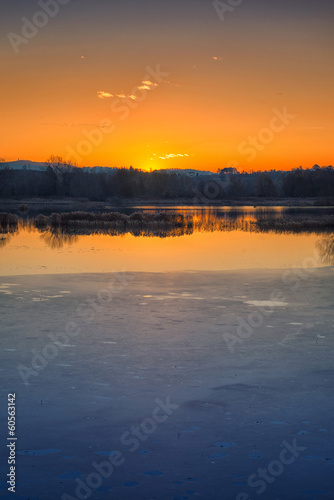 Sunset on iced water