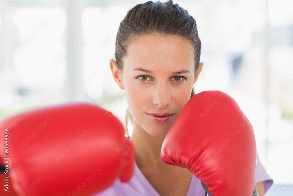 Closeup portrait of a determined female boxer Closeup portrait of a determined female boxer