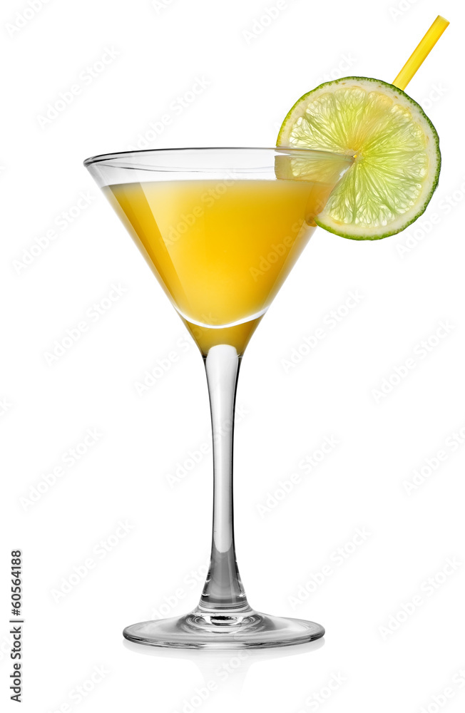 Yellow cocktail with lime